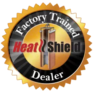 Logo that is a circle with black and gold that says Factory Trained Dealer Heat shield